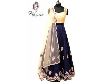 Peach Embroidered Net Choli with Navy Blue Lehenga Peach Embroidered Net Choli with Navy Blue Lehenga