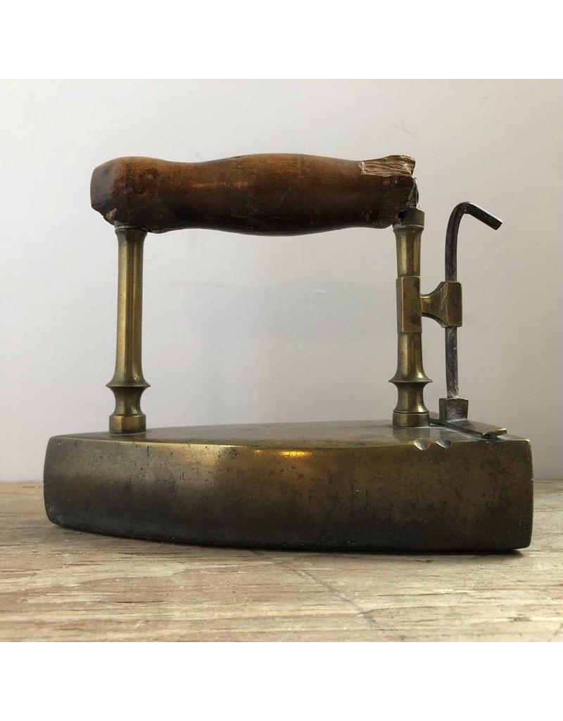 antique brass sad iron with heating slug The Argosy Antiques & Fine Vintage