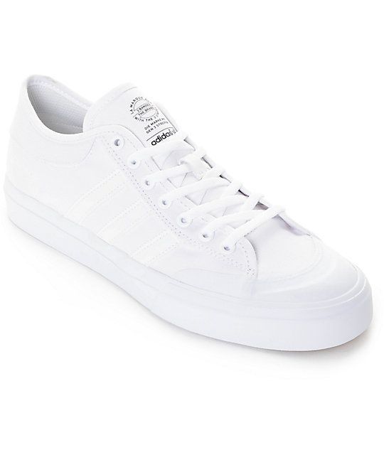 white canvas adidas shoes