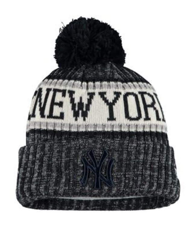 cuffed knit hat with pom