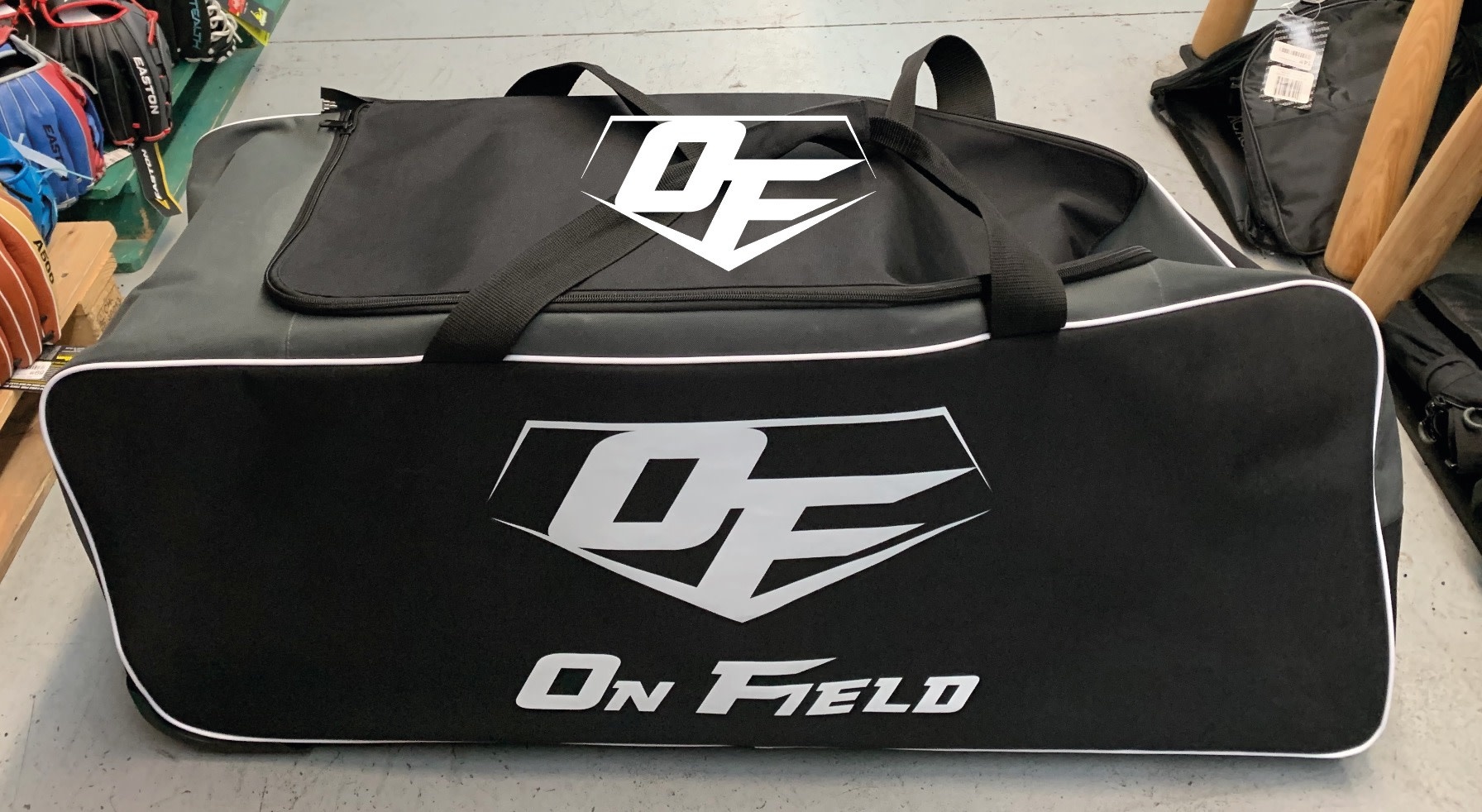 On Field Team black  roller bag with custom panel