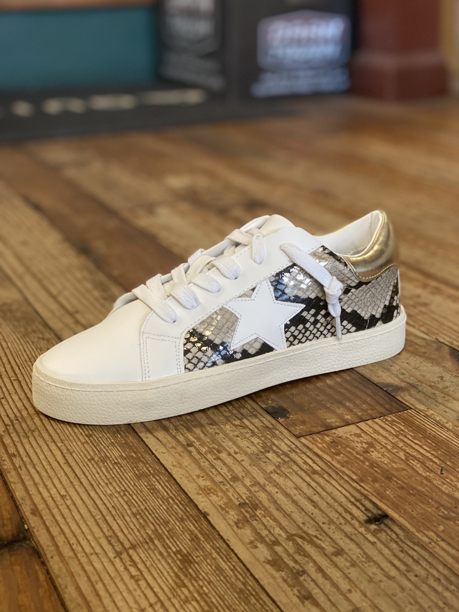 snake print slip on sneakers