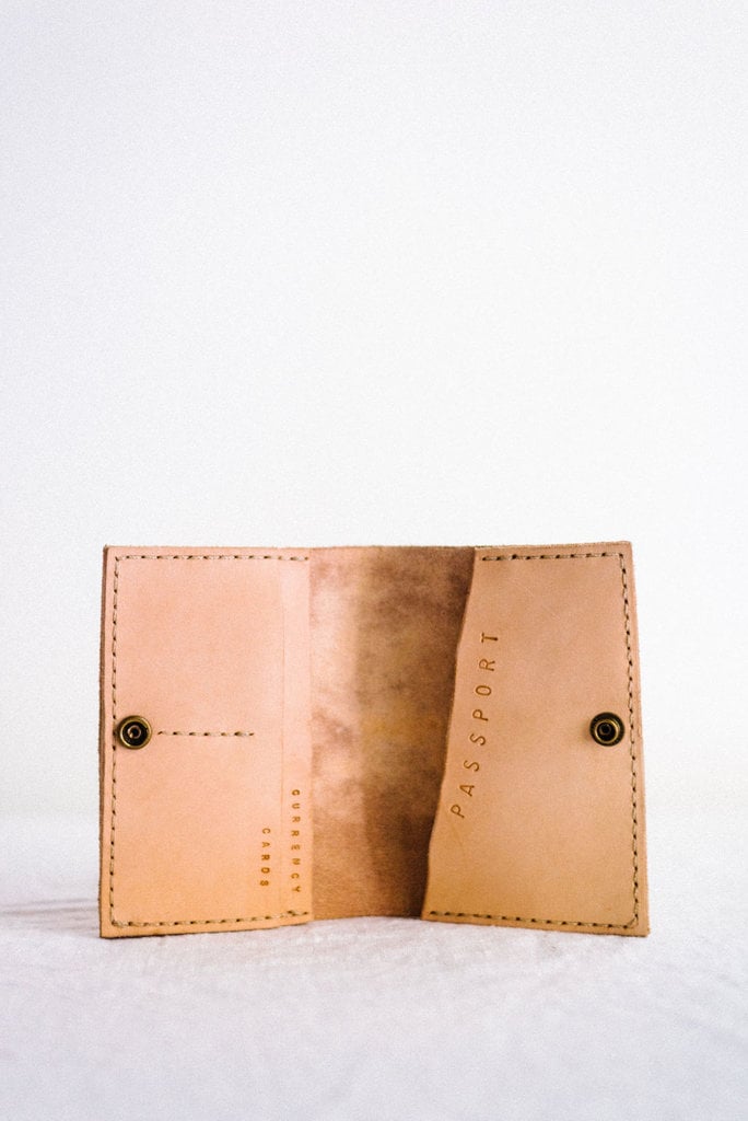 stone wild collective veggie tan passport holder