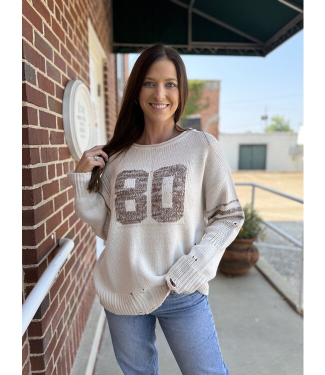 Distressed Long Sleeve Varsity Knit Top T1005