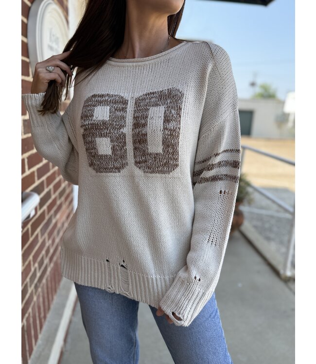 Distressed Long Sleeve Varsity Knit Top T1005