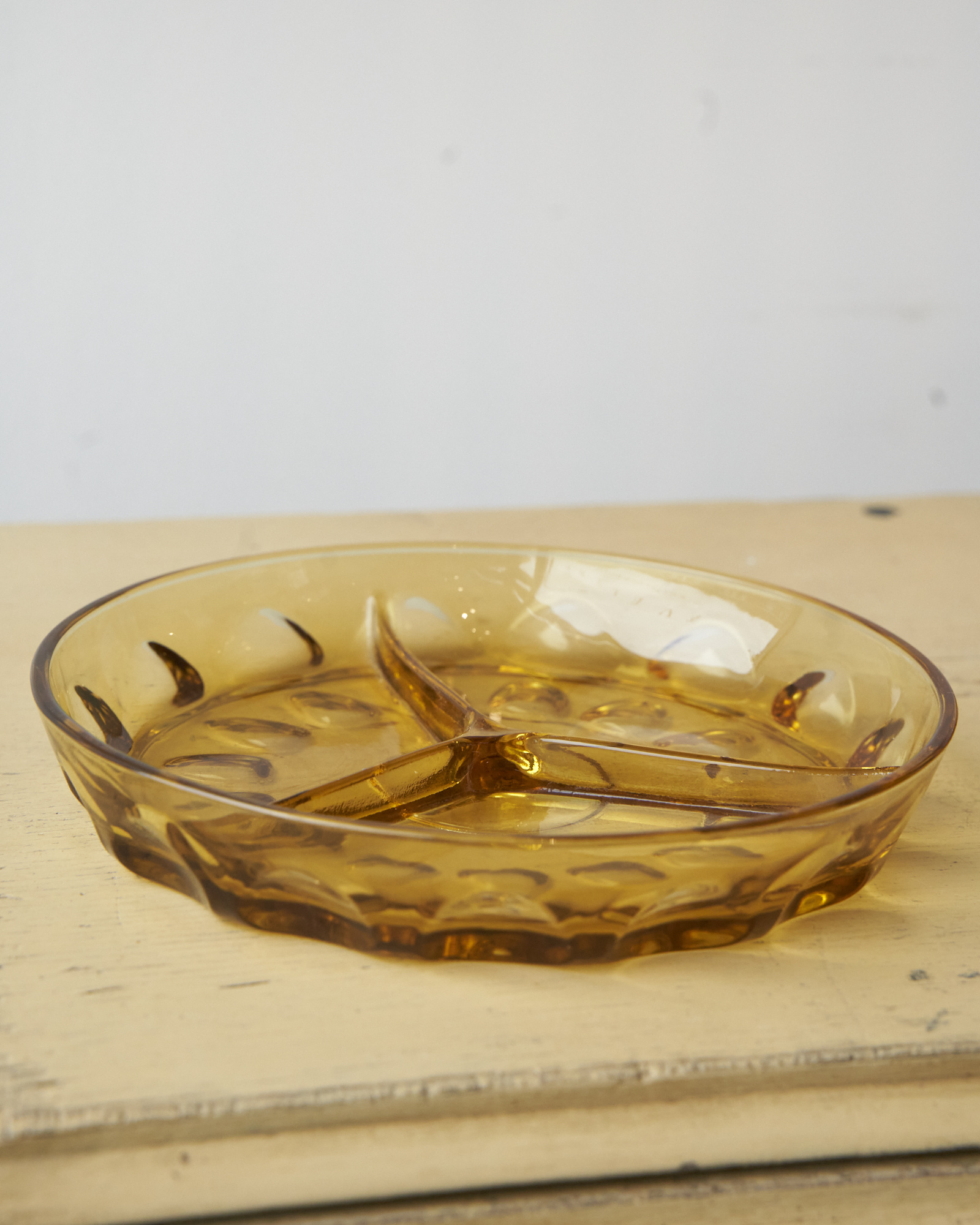 Yellow glass dish, 3 sections