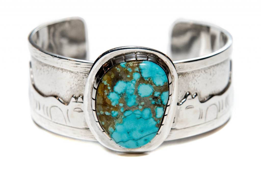 Story Bracelet with Turquoise by Terrance Campbell.