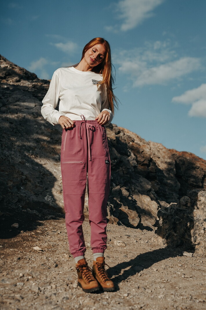 Notice the reckless BURGUNDY HIKING PANTS