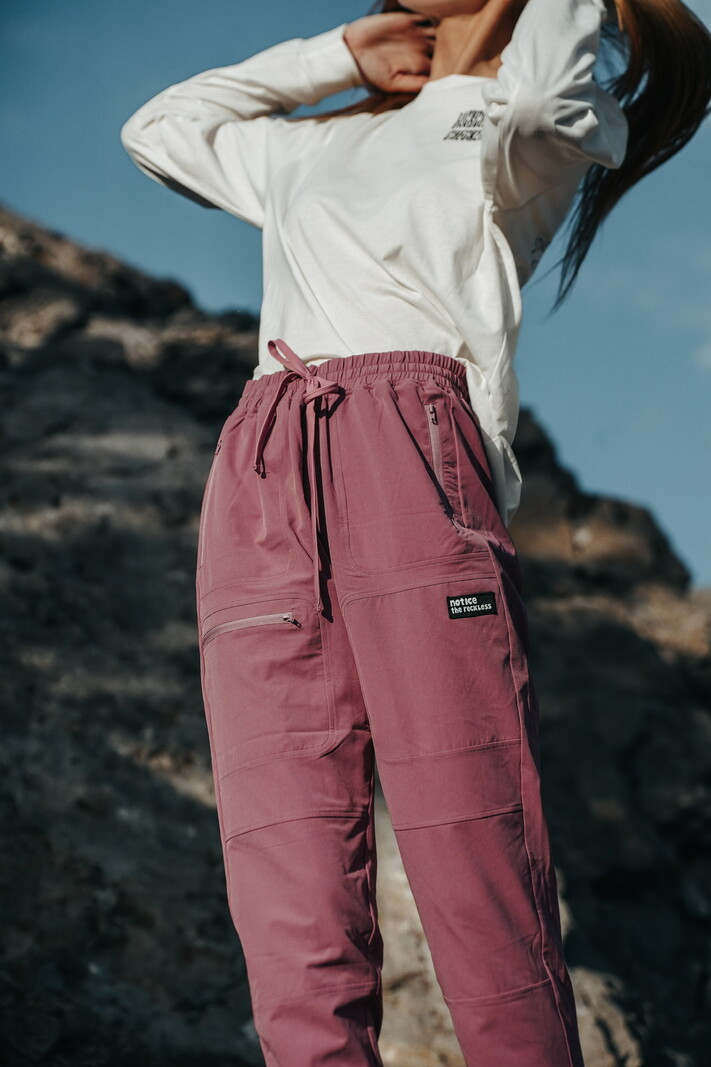 Notice the reckless BURGUNDY HIKING PANTS