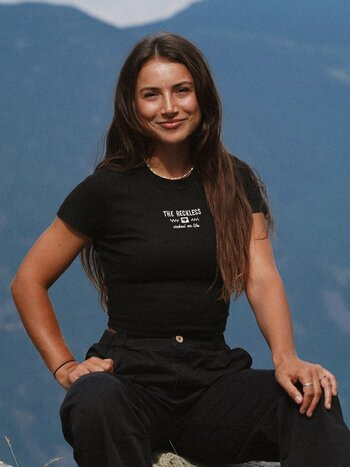 Notice the reckless FEMMES BASIC BLACK FITTED TEE