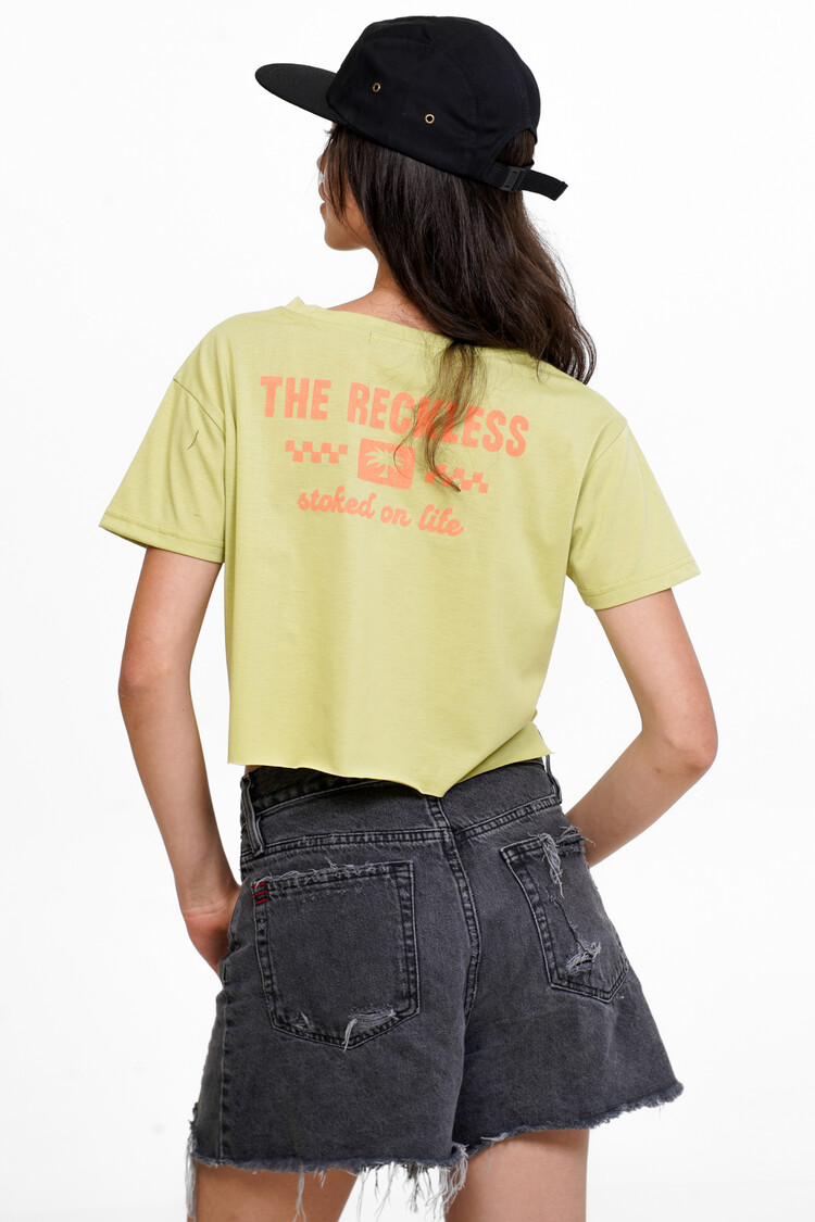 Notice the reckless WOMEN'S STOKED ON LIFE CROP TEE CHARTREUSE