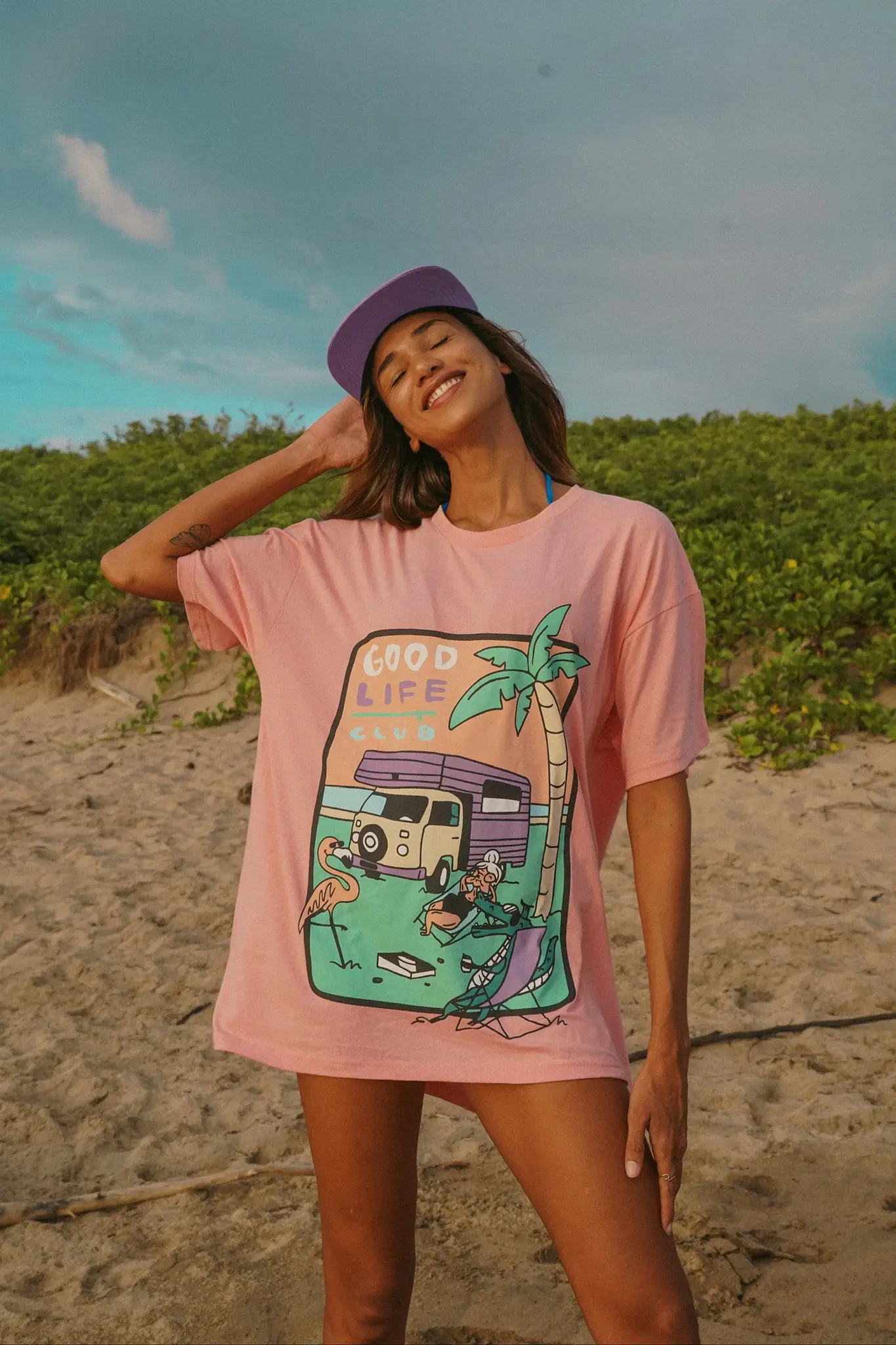 Notice the reckless GOOD LIFE CLUB OVERSIZED TEE