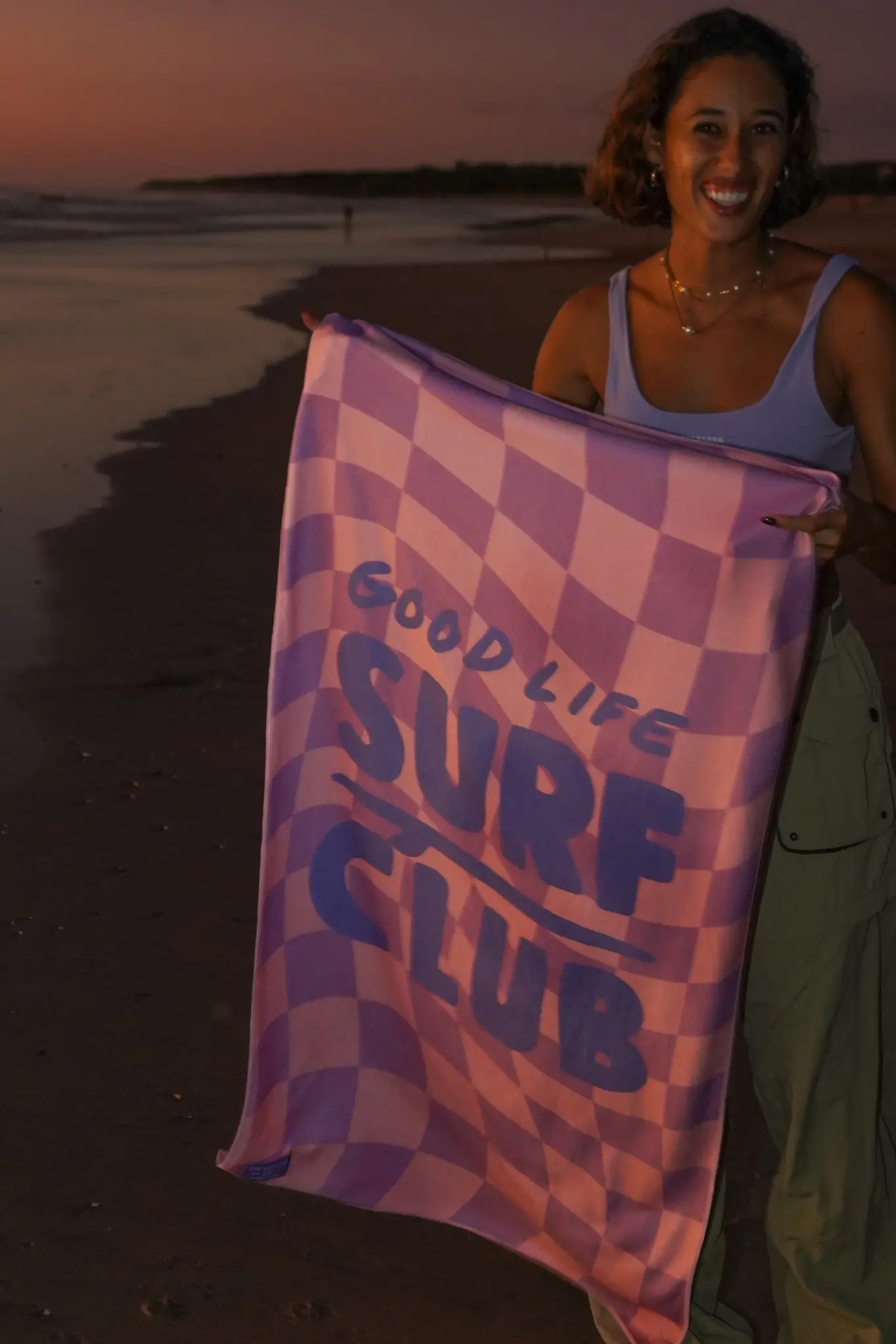 Notice the reckless CHECKERED TOWEL