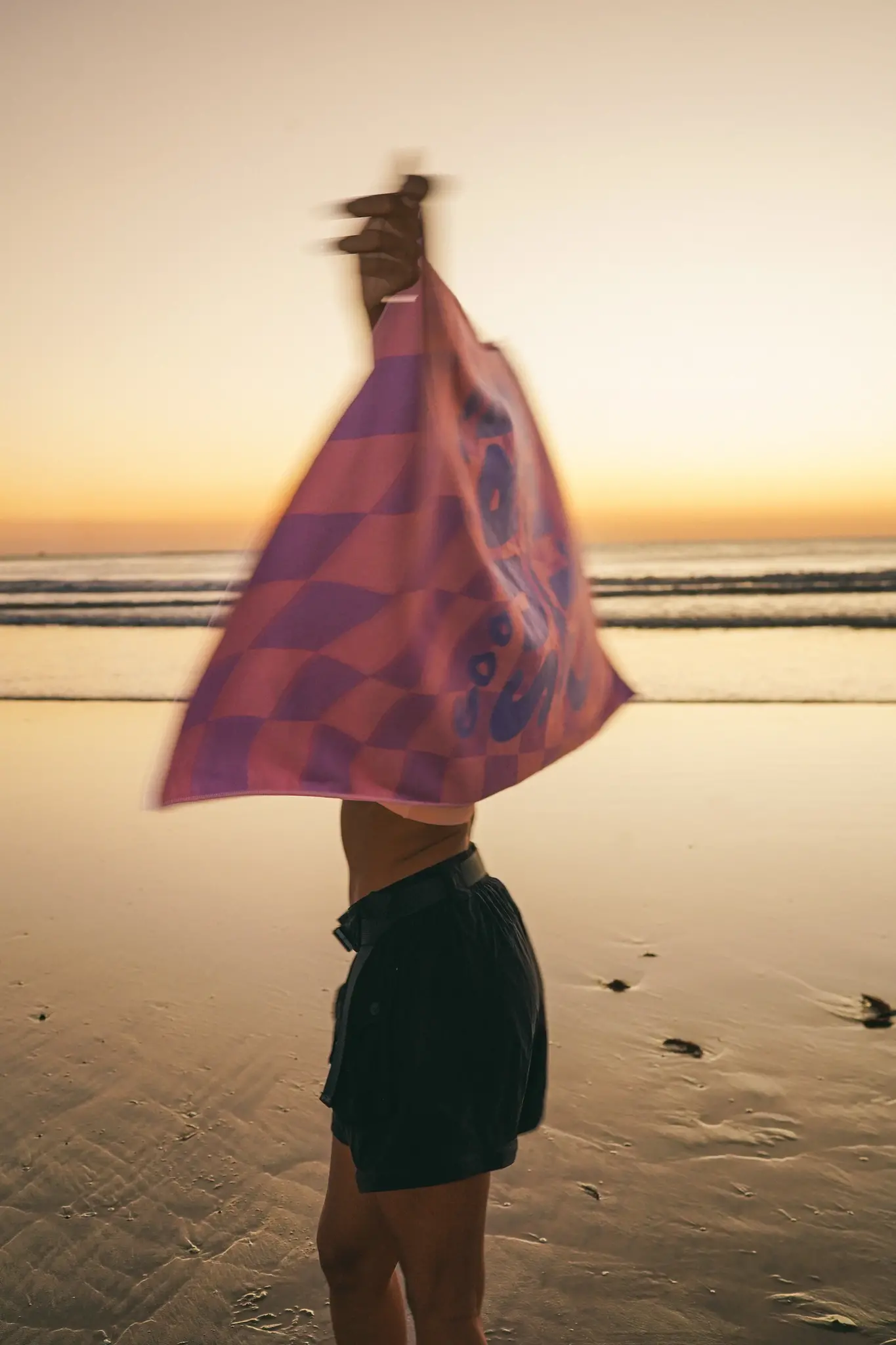 Notice the reckless CHECKERED TOWEL