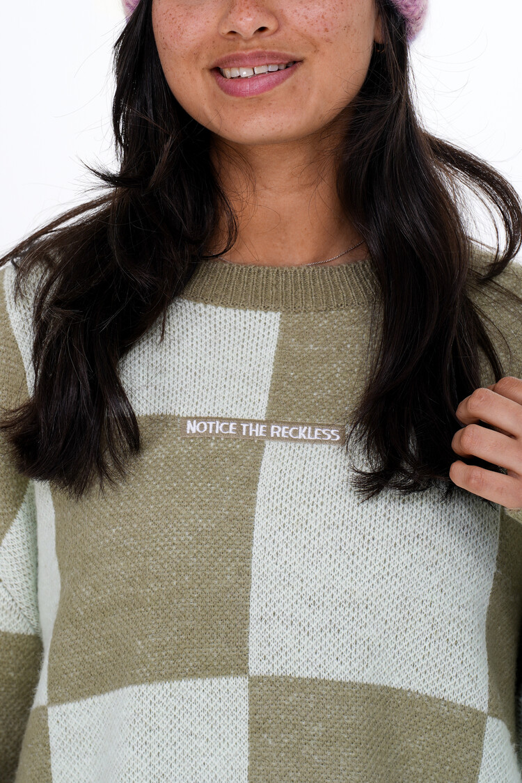 Notice the reckless WOMEN'S MOSS SWEATER