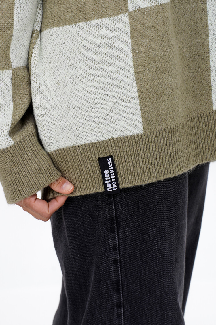 Notice the reckless WOMEN'S MOSS SWEATER