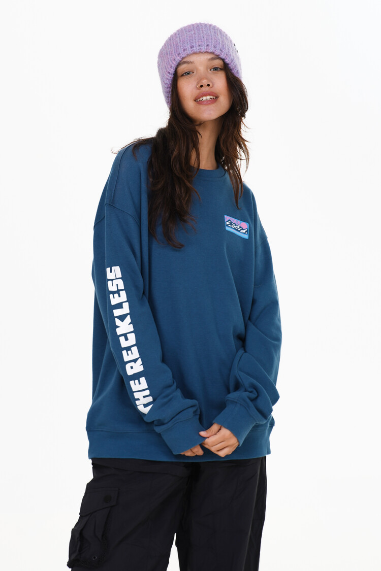 Notice the reckless FEMMES DARE TO WANDER LIGHT CREWNECK