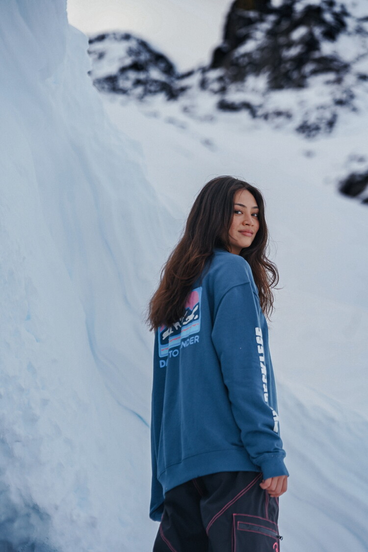 Notice the reckless FEMMES DARE TO WANDER LIGHT CREWNECK