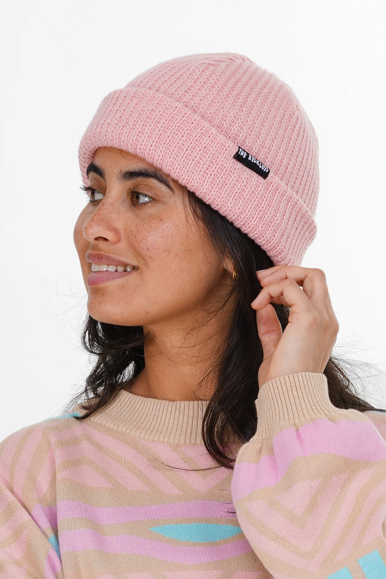 Notice the reckless WOMEN'S LIGHT PINK SMALL BEANIE