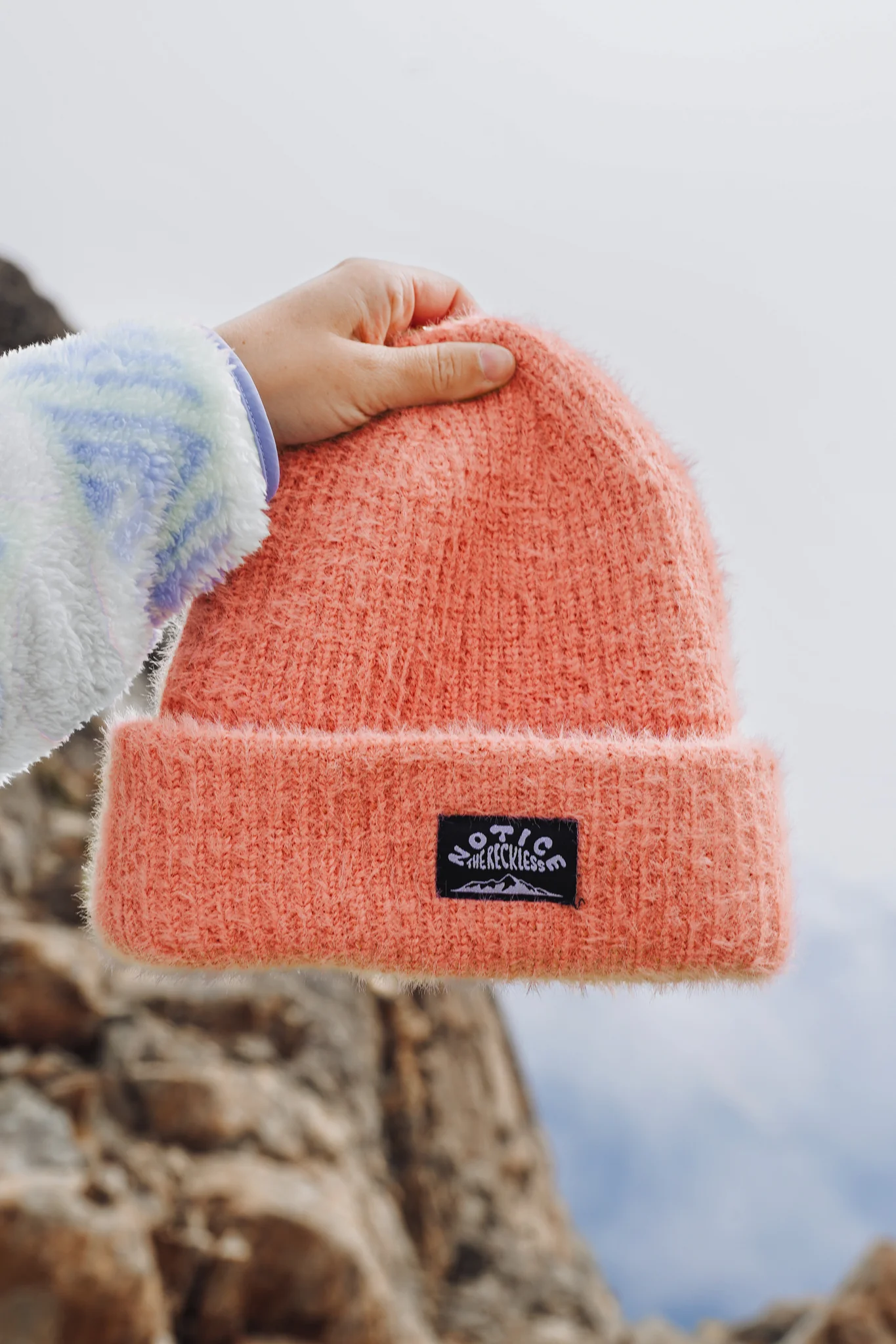 Notice the reckless FEMMES SALMON FUZZY BEANIE