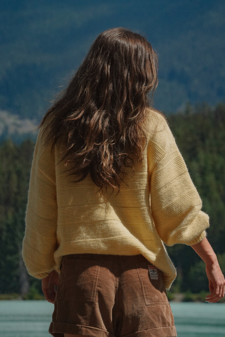 Notice the reckless WOMEN'S BUTTER YELLOW SWEATER