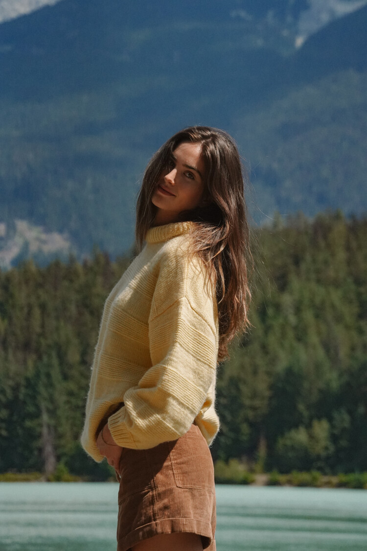 Notice the reckless WOMEN'S BUTTER YELLOW SWEATER