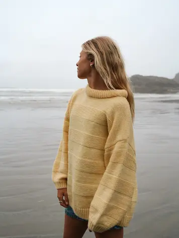 Notice the reckless WOMEN'S BUTTER YELLOW SWEATER