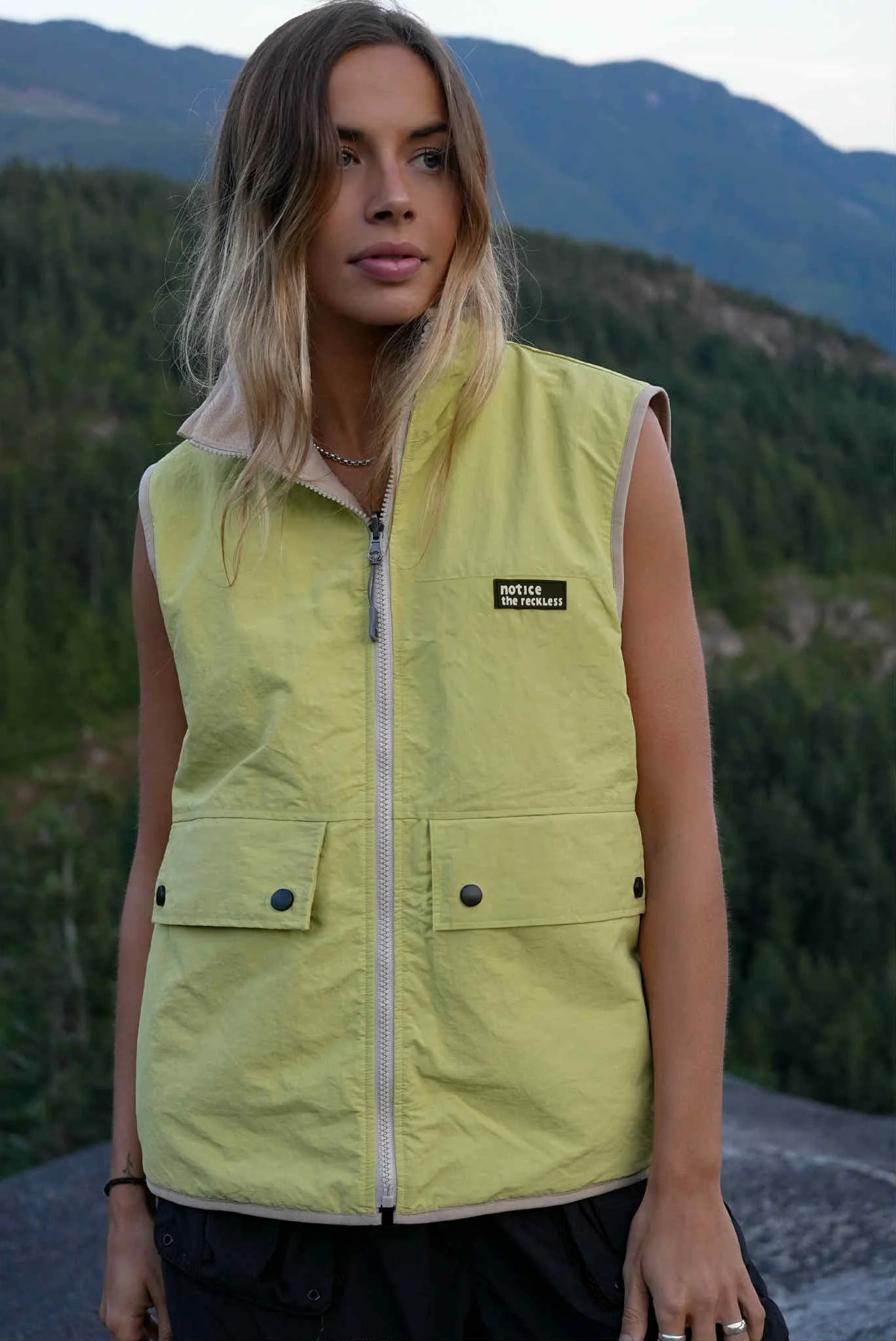 Notice the reckless WOMEN'S BLOSSOM REVERSIBLE FLEECE VEST