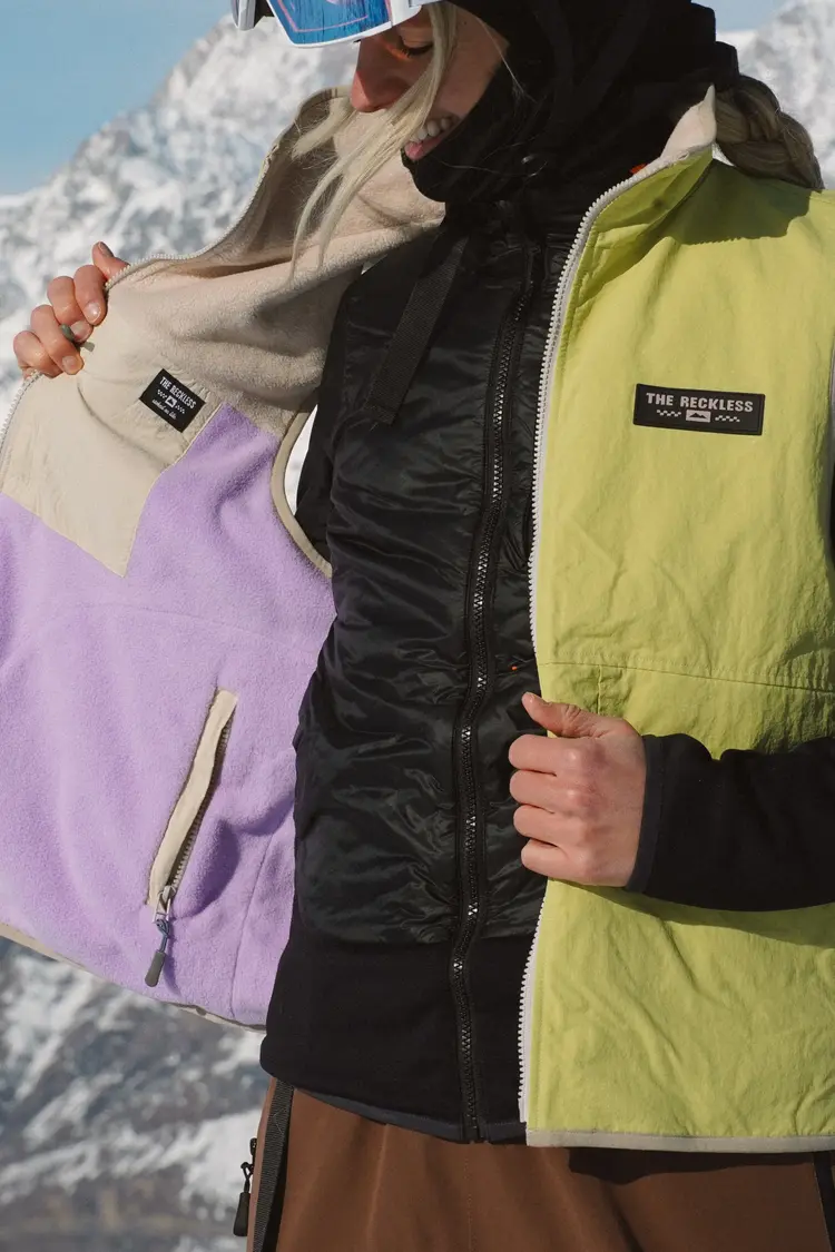 Notice the reckless FEMMES BLOSSOM REVERSIBLE FLEECE VEST