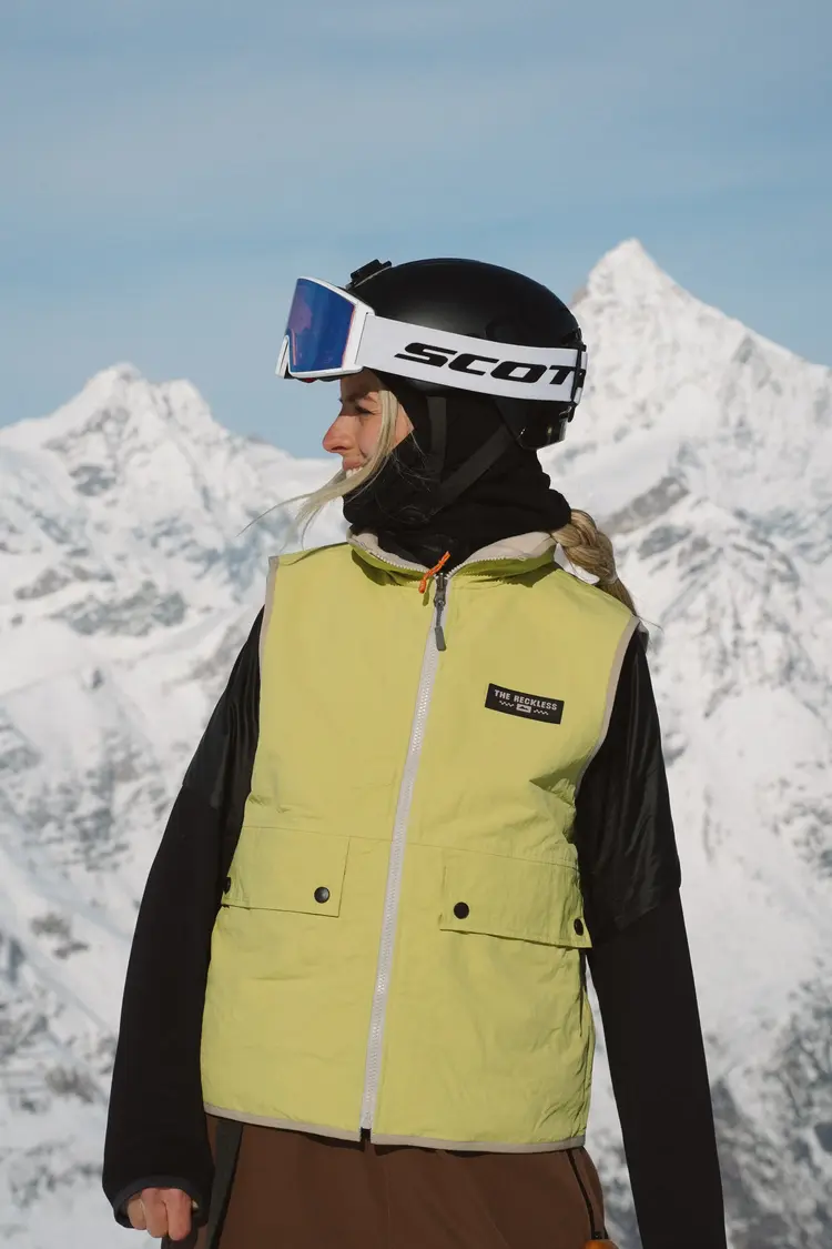 Notice the reckless WOMEN'S BLOSSOM REVERSIBLE FLEECE VEST