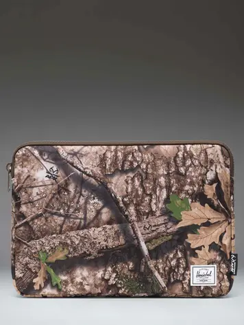 Herschel REALTREE ANCHOR 14 INCH SLEEVE REALTREE APX CAMO