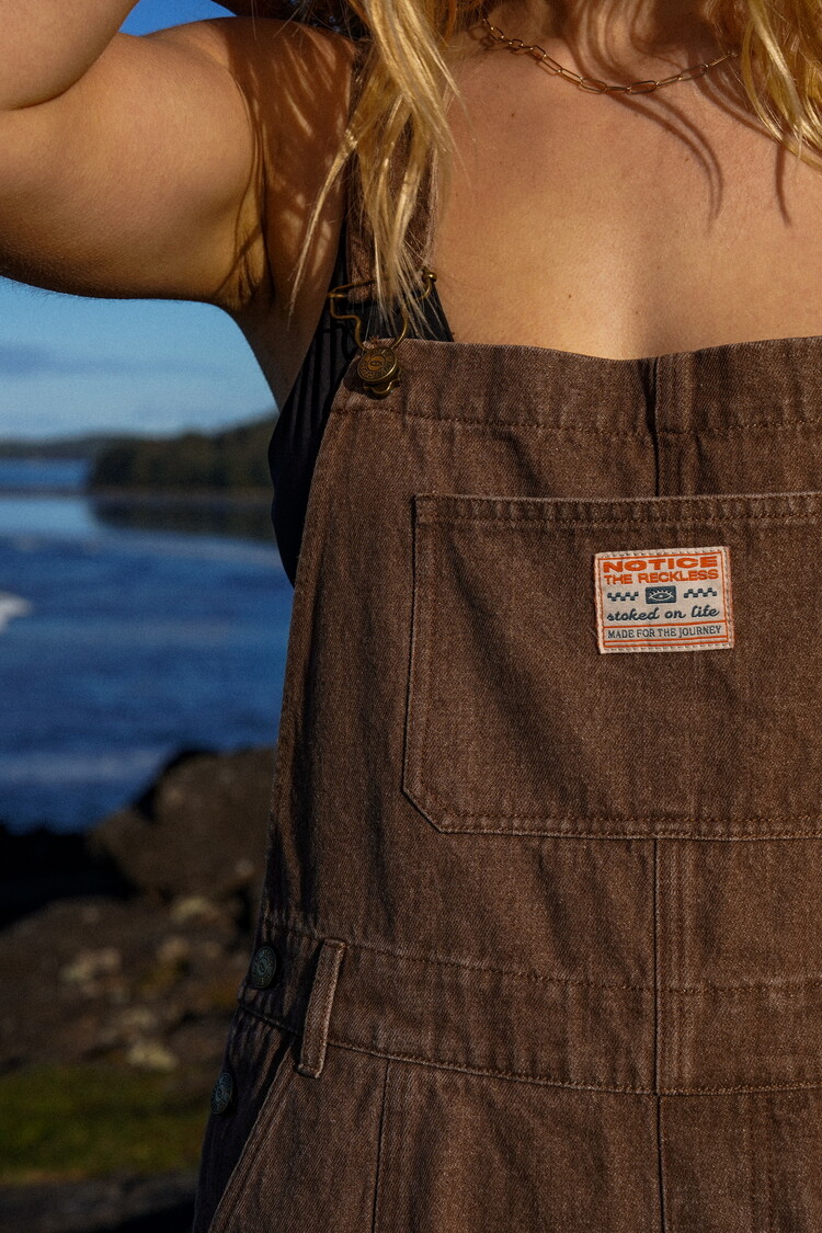 Notice the reckless FEMMES COFFEE BARREL OVERALLS