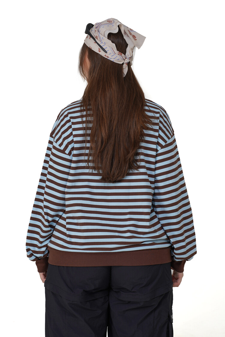Notice the reckless WOMEN'S DRIFTWOOD OVERSIZED LONG SLEEVE