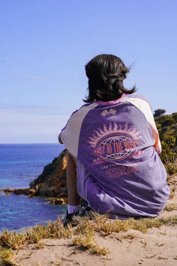 Notice the reckless WOMEN'S SCENIC ROUTE RAGLAN OVERSIZED TEE