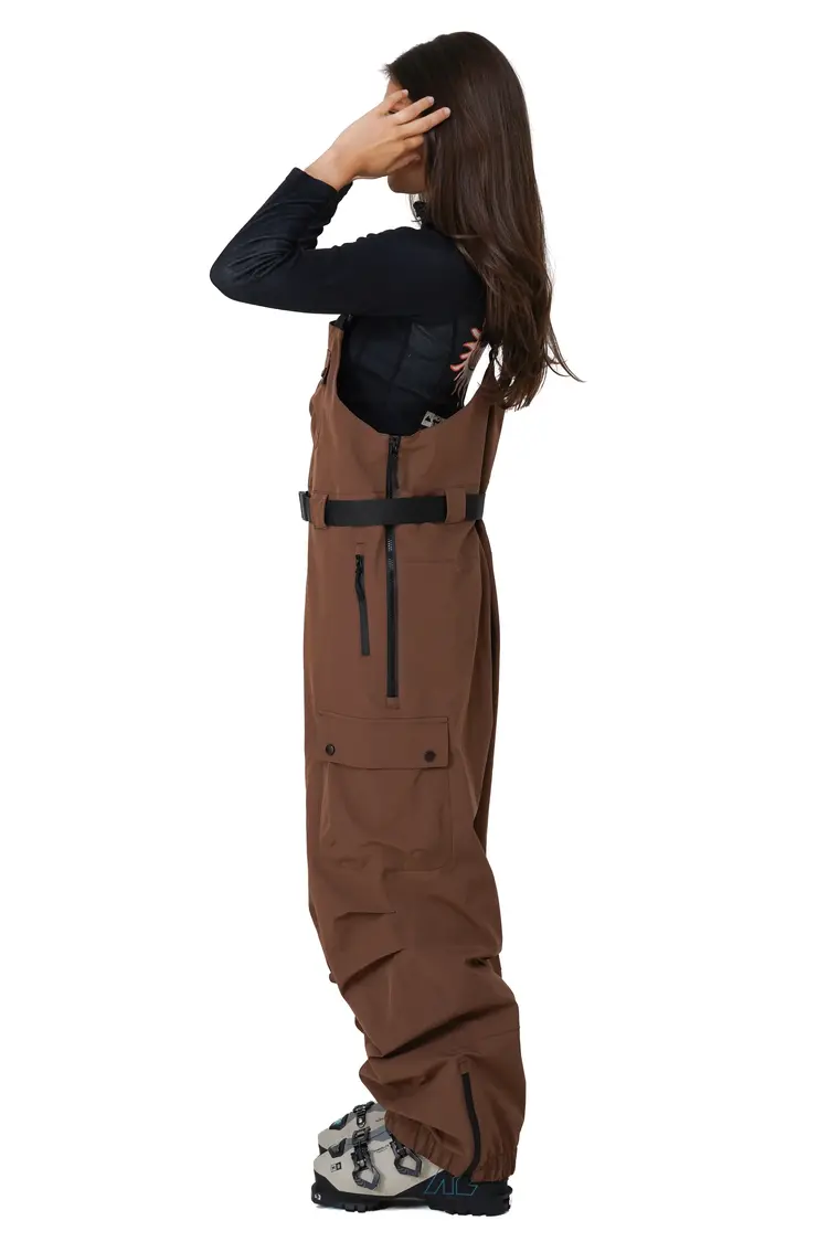 Notice the reckless WOMEN'S MUDSTONE 3-LAYER OUTER SHELL BIB