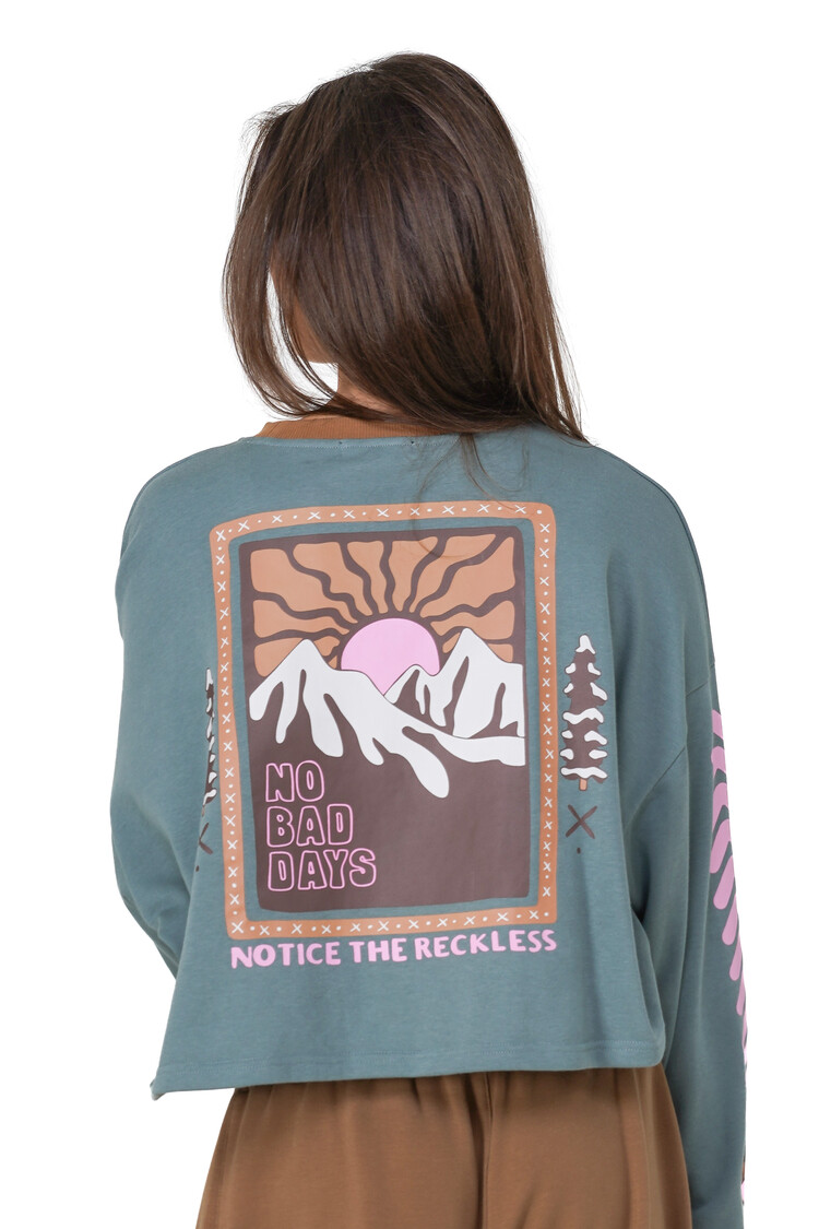 Notice the reckless WOMEN'S NO BAD DAYS CROPPED LONG SLEEVE