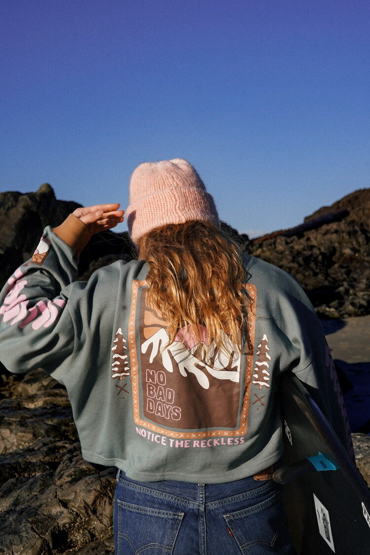 Notice the reckless FEMMES NO BAD DAYS CROPPED LONG SLEEVE