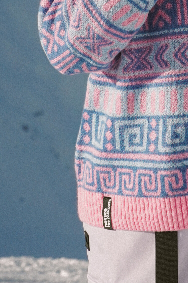 Notice the reckless FEMMES ASTRAL SHORT SWEATER