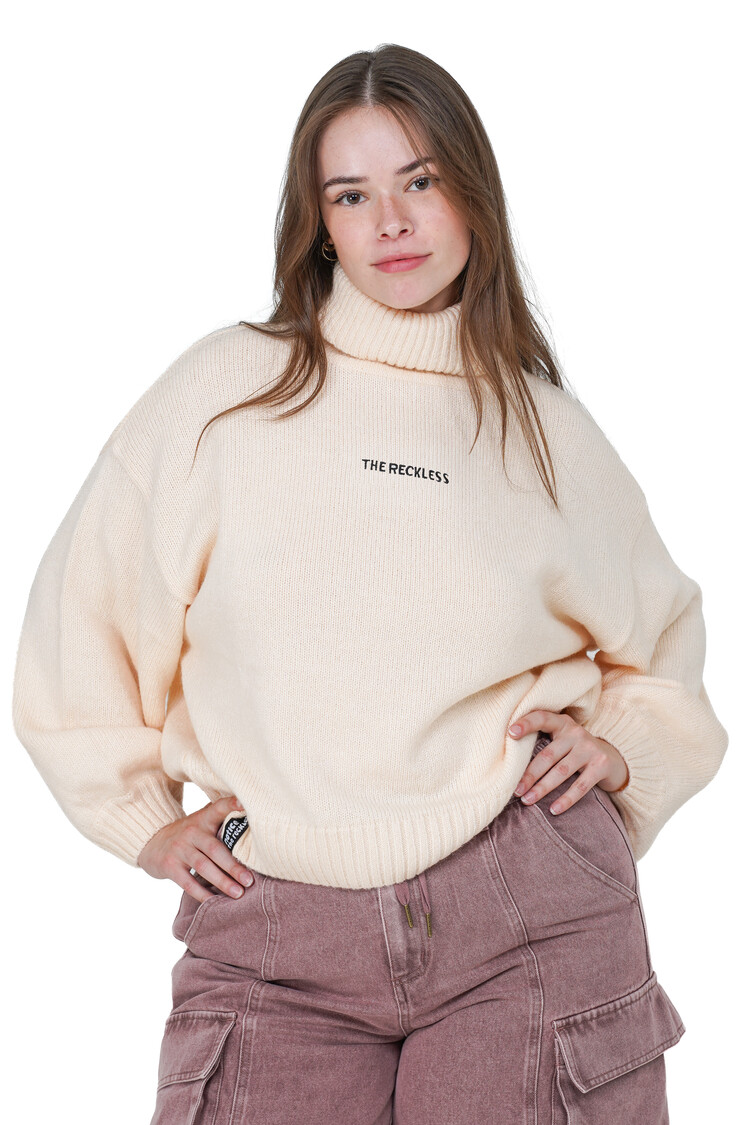Notice the reckless FEMMES SPRITZ TURTLENECK SWEATER