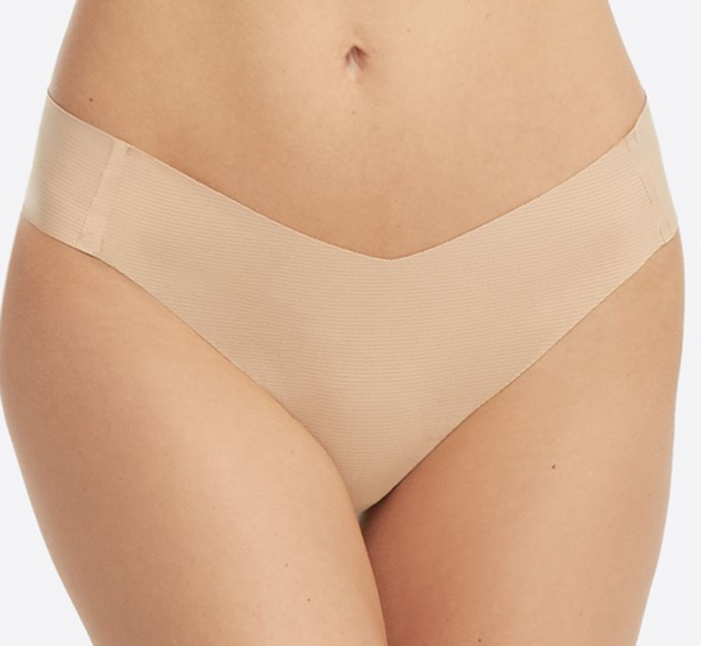 SPANX UNDER STATEMENTS THONG