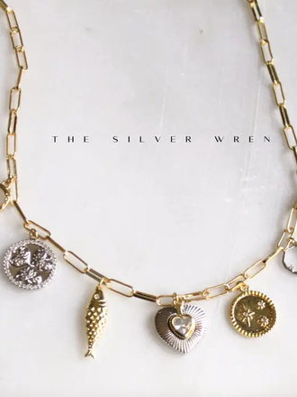 THE SILVER WREN TWO TONE MULTI CHARM NECKLACE