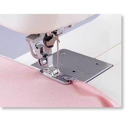 Brother 7 mm Narrow Hem Foot (Snap on foot). See catalog for list of machines; including the NV6000D