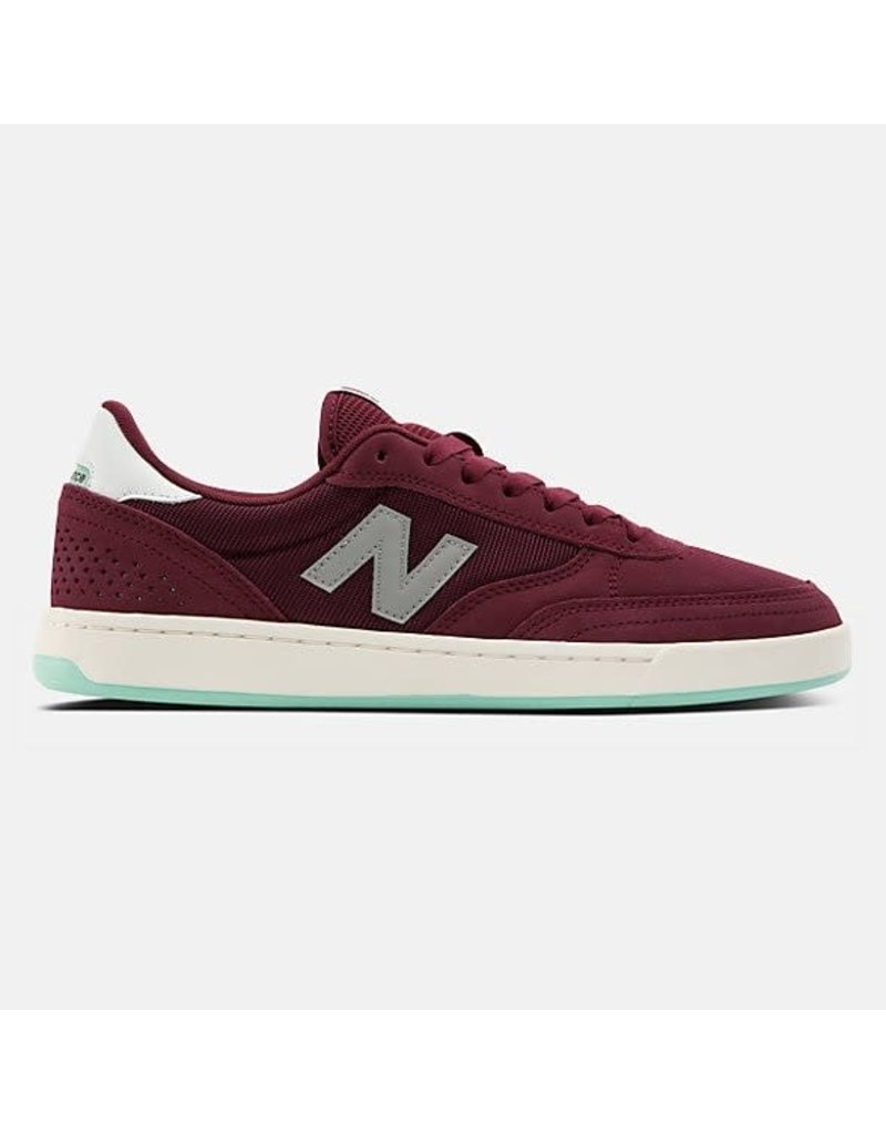 new balance burgundy sneakers