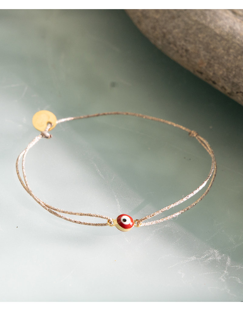 Sophie Deschamps Brass Eye Bracelet on Gold Cord