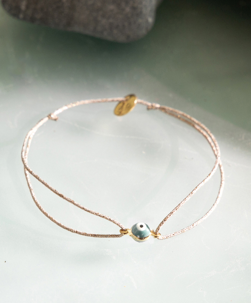 Sophie Deschamps Brass Eye Bracelet on Gold Cord