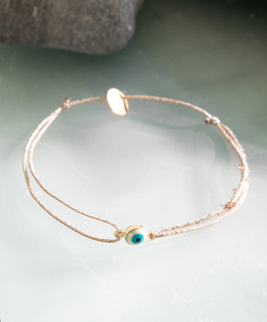 Sophie Deschamps Brass Eye Bracelet on Gold Cord