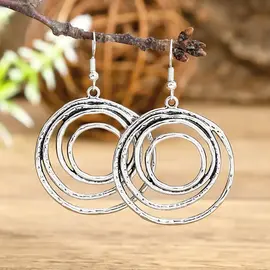 EARRINGS - ORGANIC SILVER CIRCLES