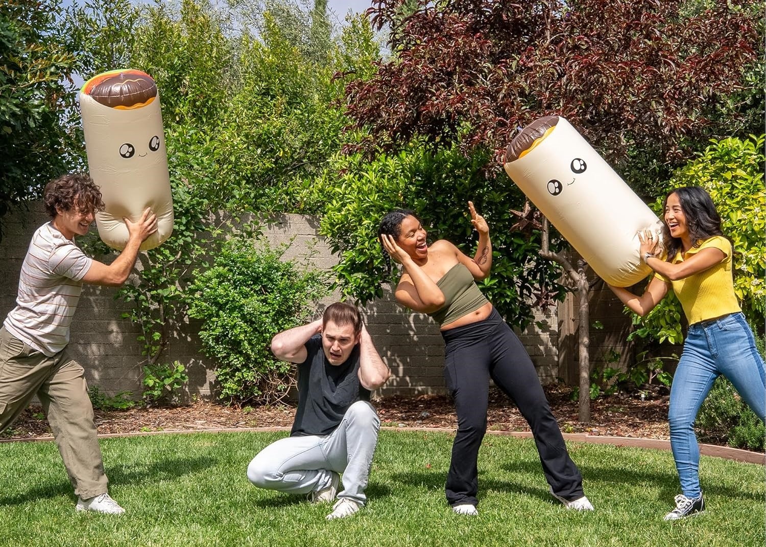 Friends playing Throw Throw Burrito Extreme Outdoor Edition.