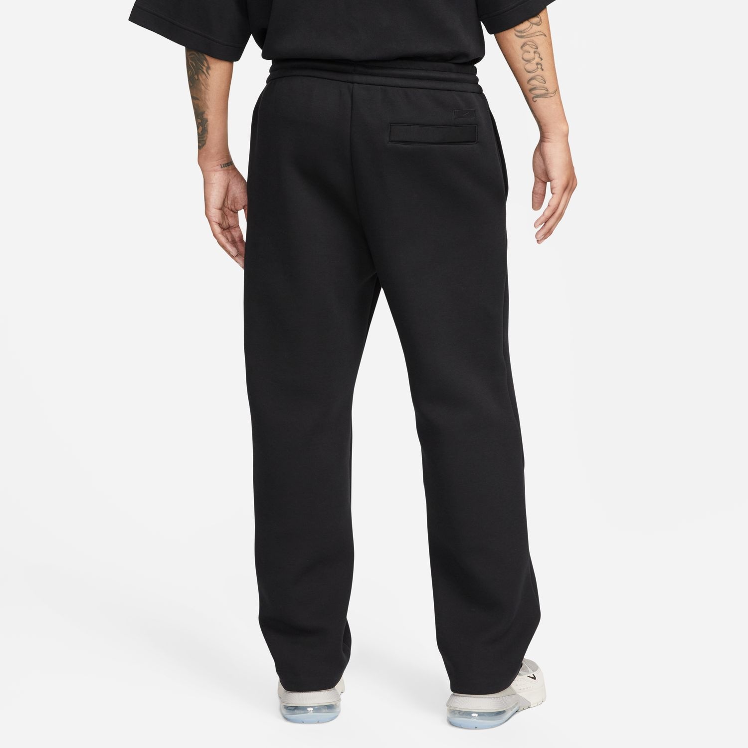 Nike Reimagined Tapered Tech Fleece Sweatpants in Black for Men