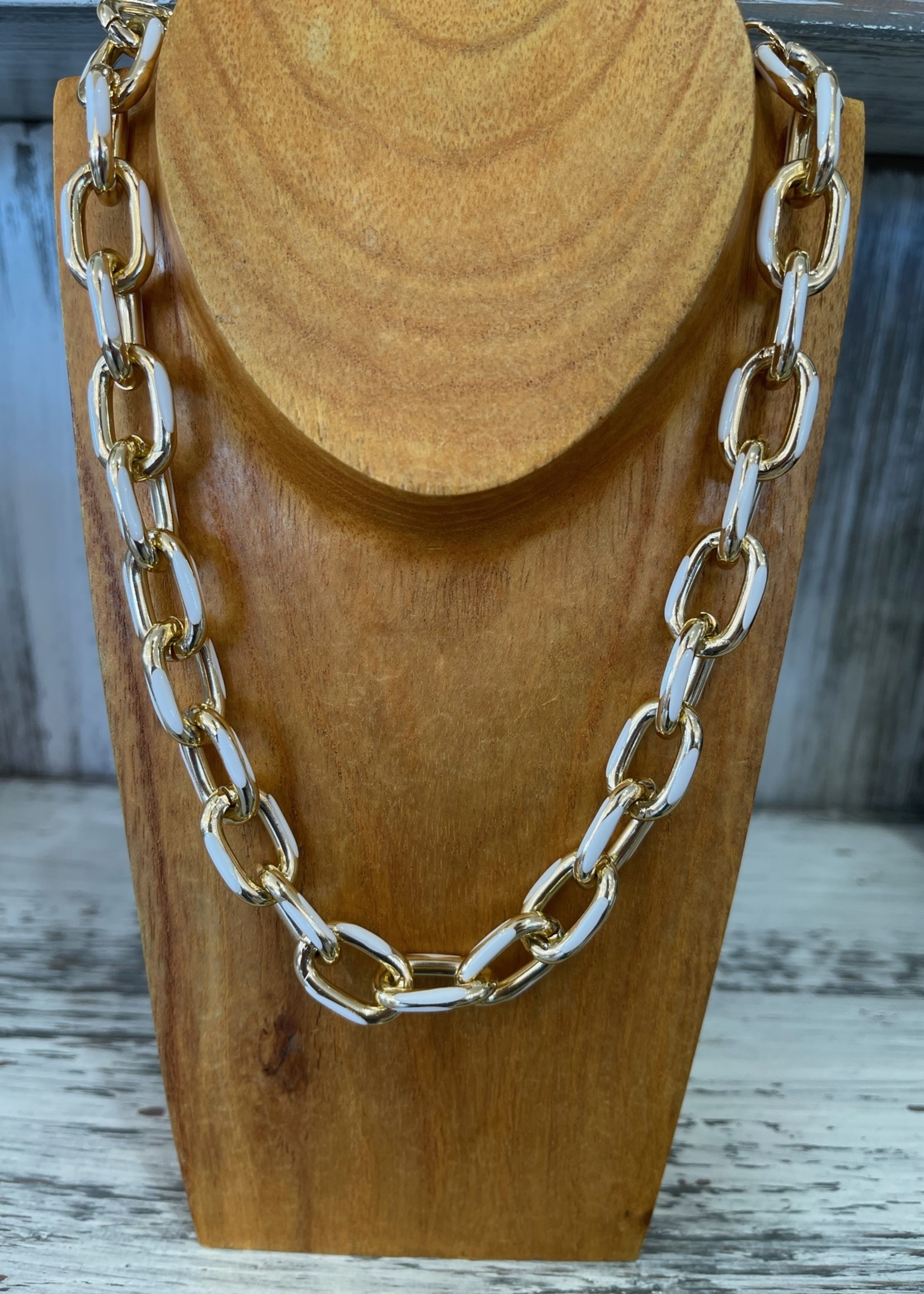 white and gold chain necklace